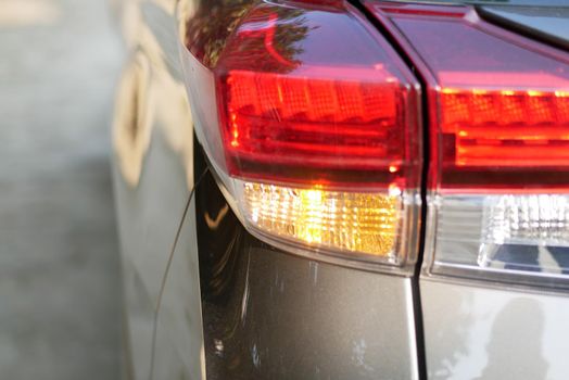 rear left car lantern on red SUV. High quality photo