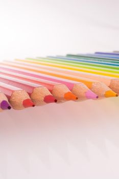 Color pencils of various color on a white background