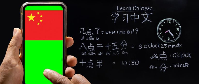 Learning chinese alphabet "pinyin" to tell time online class room.