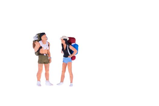 Close up of Miniature backpacker and tourist people isolate on white background. Elegant Design with copy space for placement your text, mock up for travel concept