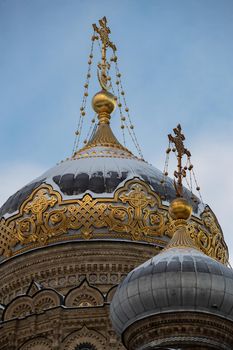 The golden dome of the Cathedral of Lieutenant Schmidt on a clear winter frosty day, orthodox church, close up view. High quality photo
