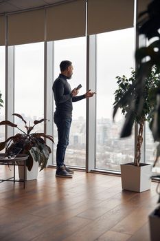 matured happy man at modern office