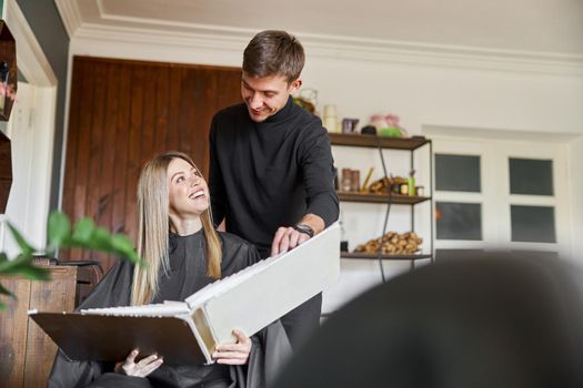 Happy beautiful light hair caucasian woman at beauty salon