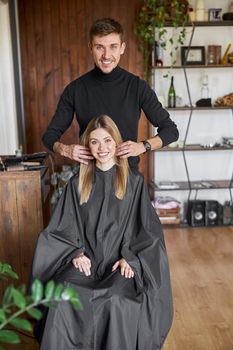 Happy beautiful light hair caucasian woman at beauty salon