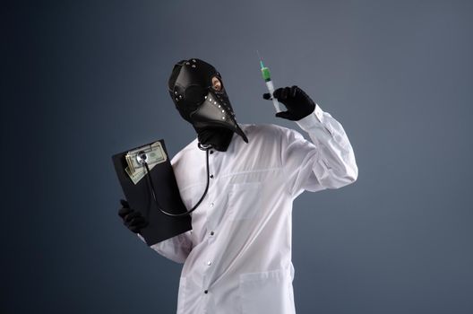 a doctor in a dressing gown, in a plague doctor's mask, is vaccinating