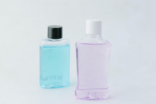 mouthwash liquid in a container on table ,