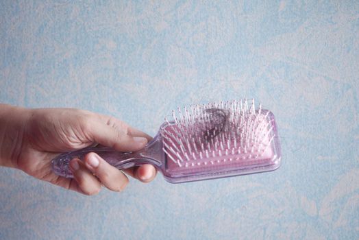 a brush with lost hair