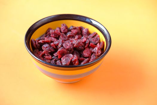 detail shot of dried cranberries on table .