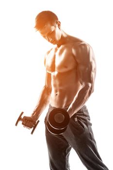 Handsome muscular man doing exercises with dumbbells isolated on white background Whith solar flare