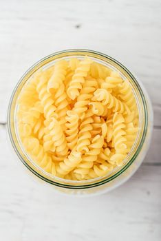 Jar of Italian whole wheat fusilli pasta. View from above