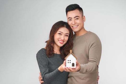 Happy young asian couple with new home concept.