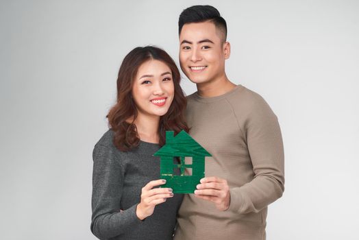 Happy young asian couple with new home concept.