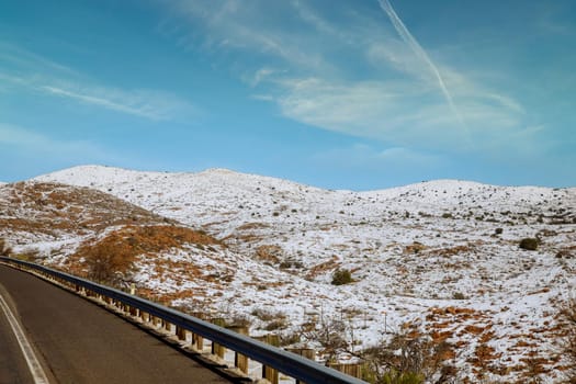 Snowy mountain panorama view in Arizona winter with of Interstate 17 snow clear blue sky.