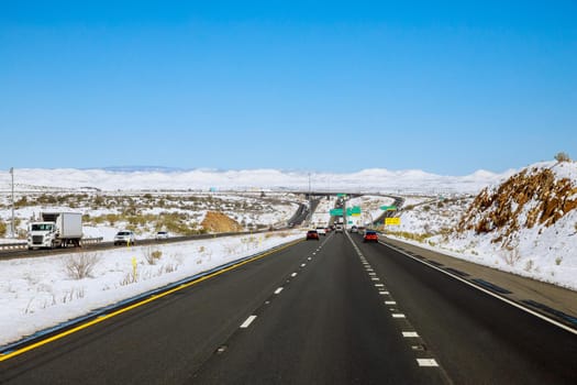 Panorama view of snowy mountain desert after the snowstorm in Arizona winter snow with of Interstate I-17