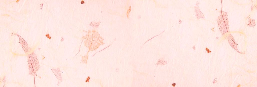 background of light pink, textured, handmade mulberry paper, long banner format