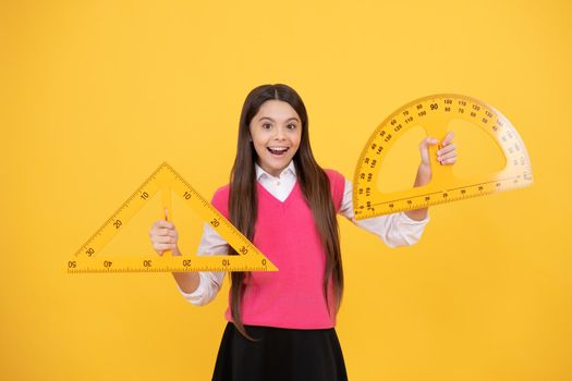 Math Matters. stem disciplines. concept of education. measuring angle degree. child with triangle. surprised teenage girl with ruler. back to school. trigonometry stationery. kid study mathematics.