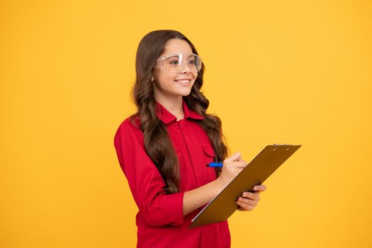 happy kid girl in eyeglasses hold paper folder, education.