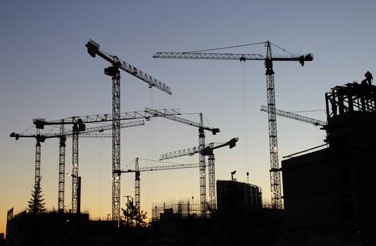 Tower cranes. Construction of a multi-storey residential complex ZILART. Moscow. Avtozavodskaya street. 11.17.2021. Multi-storey construction.