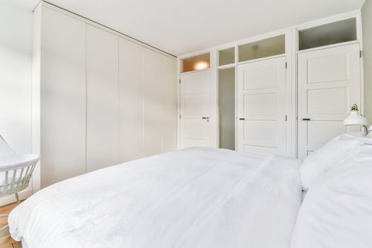 Cozy bedroom with a huge bed and pillows