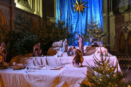 Christmas nativity scene without baby Jesus in the church