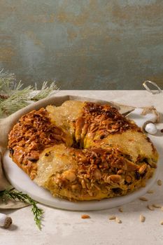 Bolo Rainha or Queen's Cake, Made for Christmas, Carnavale or Mardi Gras with Present Wrapping in Background.