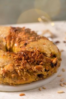 Bolo Rainha or Queen's Cake, Made for Christmas, Carnavale or Mardi Gras with Present Wrapping in Background.