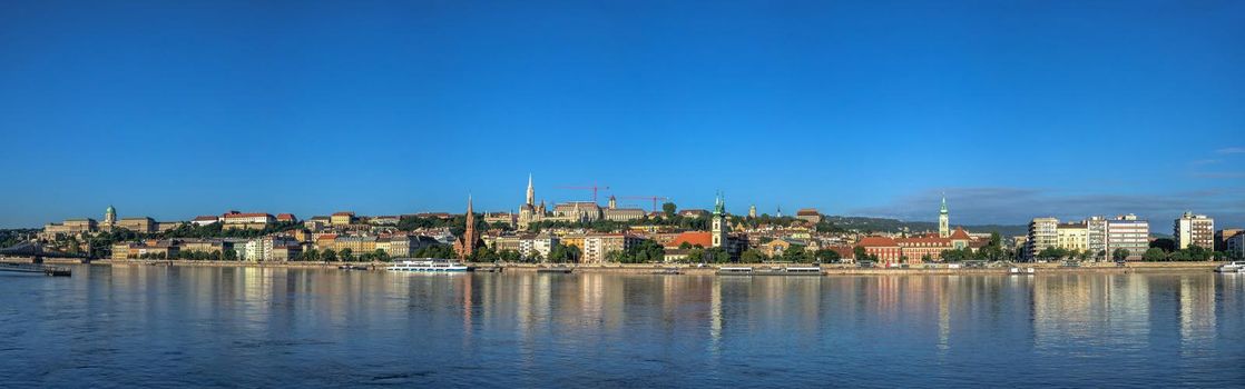 Budapest, Hungary 18.08.2021. Panoramic view of the Danube river and the embankment of Buda on a sunny summer morning