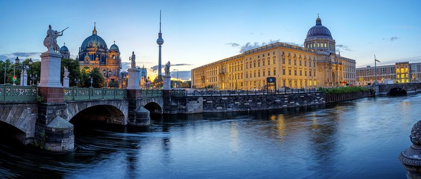 Panorama of the Berlin Cathedral, the TV Tower and the reconstructed City Palace before sunrise