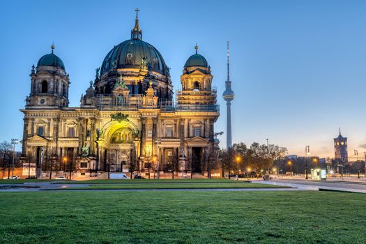 The Lustgarten with the Cathedral and the famous TV Tower in the back before sunrise, seen in Berlin, Germany