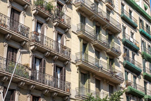 Typical facade of an apartment building seen in Barcelona, Spain