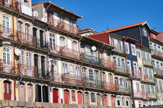 Colorful house facades seen in the old town of Porto in Portugal