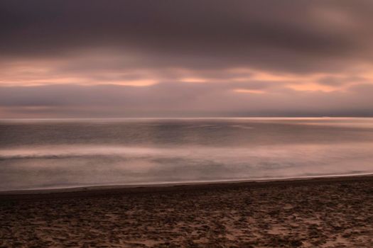 Beautiful Sunrise on the beach in winter in Arenales del Sol, Alicante,southern Spain