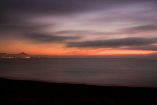 Beautiful Sunrise on the beach in winter in Arenales del Sol, Alicante,southern Spain