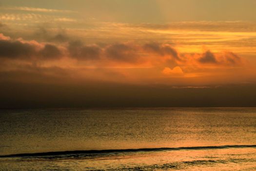 Beautiful Sunrise on the beach in winter in Arenales del Sol, Alicante,southern Spain