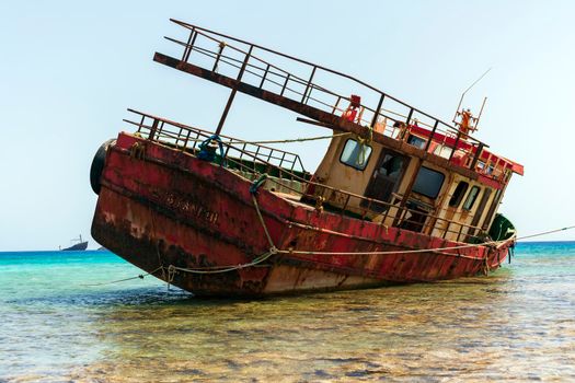 Shipwreck near Diakofti beach, Kythera island, Greece. The shipwreck of the Russian boat Norland in a distance.