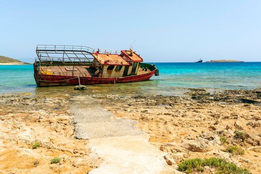 Shipwreck near Diakofti beach, Kythera island, Greece. The shipwreck of the Russian boat Norland in a distance.