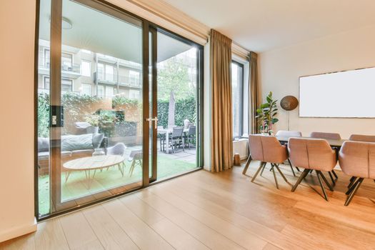Superb dining room with long table with stylish lamp