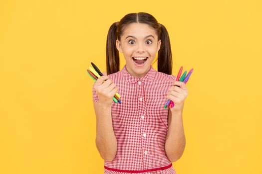 amazed teen girl hold colorful markers office supplies for painting, creative mind.