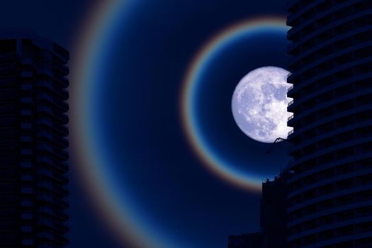 super fruit blue moon corona back silhouette building on the night sky, Elements of this image furnished by NASA