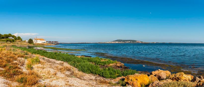 Sète is an important port city in the south-east of France, located in Occitanie. It is bordered by the Thau lagoon, a saltwater lagoon which is home to various animal species. Along a narrow isthmus, the Mediterranean coast of Sète is made up of sandy beaches.