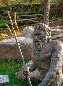 Uman, Ukraine 07.11.2020. Park sculpture in the Sofievsky arboretum or Sofiyivsky Park on a sunny autumn day