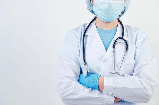 Professional doctor doing arms crossed gesture for build confidence in patients on white background. Medical personnel and Health people concept. Copy space