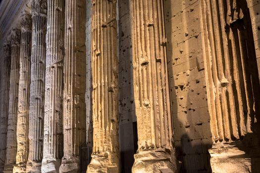 Rome, Italy. Detail of illuminated column architecture of Pantheon by night. Useful as archaeology background.