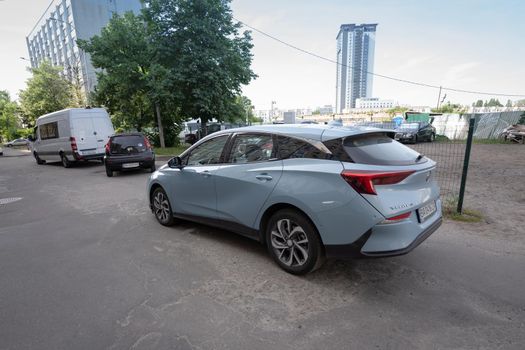 Back view of Chinese Electric vehicle Buick VeLite 6 on streets of Kyiv, near EV charging station. General Motors family next generation electric car based on Chevrolet Bolt technology . 17th of june 2021 Kyiv, Ukraine,. High quality photo