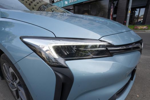 Front lighting, day lights of Chinese Electric vehicle Buick VeLite 6 on streets of Kyiv, near EV charging station. General Motors family next generation electric car based on Chevrolet Bolt technology . 17th of june 2021 Kyiv, Ukraine,. High quality photo