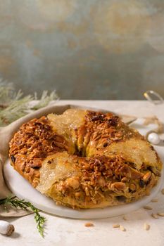 Bolo Rainha or Queen's Cake, Made for Christmas, Carnavale or Mardi Gras with Present Wrapping in Background.