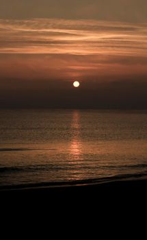 Beautiful Sunrise on the beach in winter in Arenales del Sol, Alicante,southern Spain