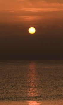 Colorful sun at sunrise over the mediterranean sea in southern Spain in Winter