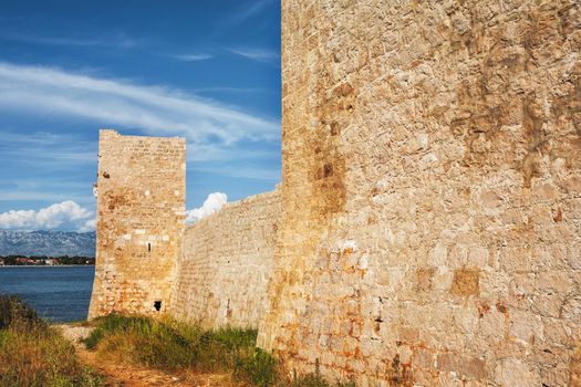 Kastelina castle, fortress ruins on Vir island, Croatia, Europe. Summer time.