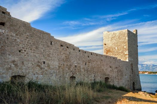 Kastelina castle, fortress ruins on Vir island, Croatia, Europe. Summer time.